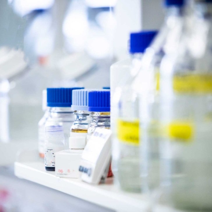 Bottles on lab shelf